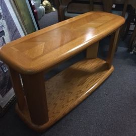 Sofa table or coffee table, laminated Oak. 24 inches tall, 4 feet long, 18 inches wide.
 There are two of these available 