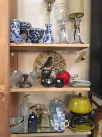 Ceramic blueware pottery, fondue pot, silver creamer and sugar bowl, a bird clock, small teapots, glass decanter, and other ceramic in glassware