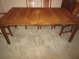 Dining table with one leaf-clean lines