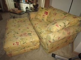 Sealy chair and a half with a twin pull out sleeper and storage in the ottoman