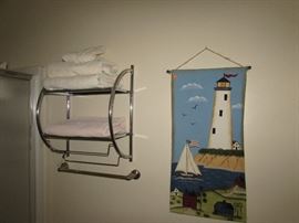 Wall decor and another Chrome color towel shelf