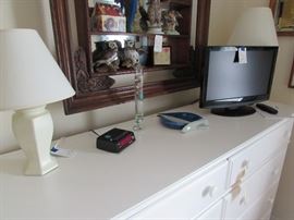 TV, lamp, floating thermometer, sailboat dish, clock