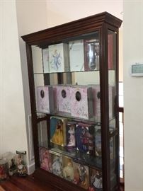 Dolls and display cabinet