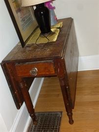 Primitive drop-leaf gate-leg table