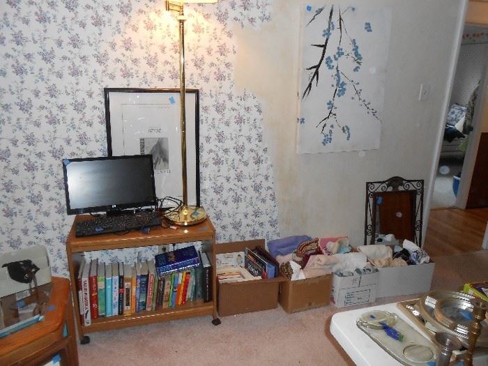 Computer monitor, books, TV cart, pictures