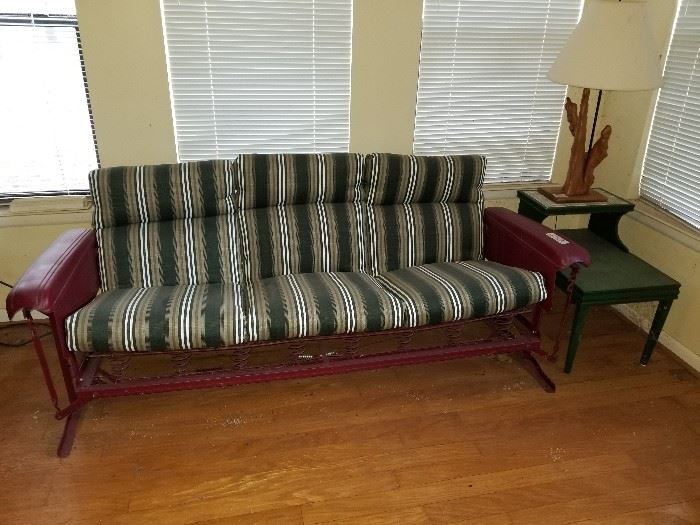 vintage  glider  metal sofa been inside in beautiful condition 
