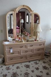 Dresser with mirror matches other bedroom furniture