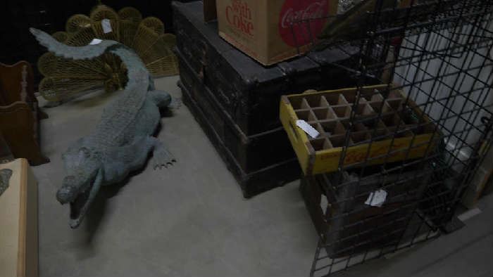 life size bronze alligator , antique trunk, vintage crates