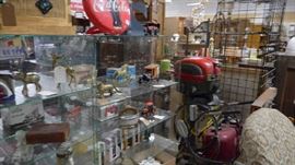 vintage 25 hp outboard motor with tank and remote controls, brass collections, cast car bank, small gas pumps