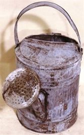 Galvanized water can