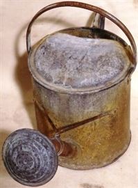 Galvanized water can