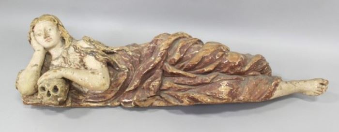 Lot 327: Carving of Magdalene Reclining Holding a Skull