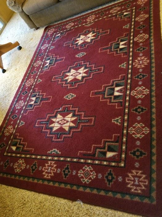 Very nice burgundy rug.  Good condition. No pets