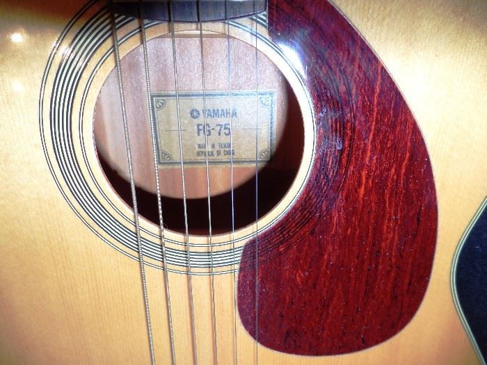 view into the vintage Yamaha acoustic guitar