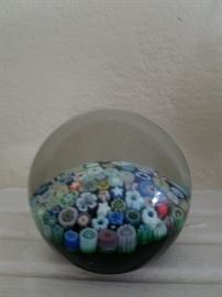 There is a collection of Art Glass Paperweights.