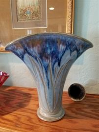 There are many pieces of Art Pottery 