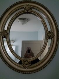 This is a lovely Oval Mirror - However it is plastic 