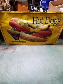 Two alike vintage hot dog signs