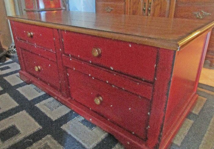 Unusual chest/coffee table .... drawers pull from either side
