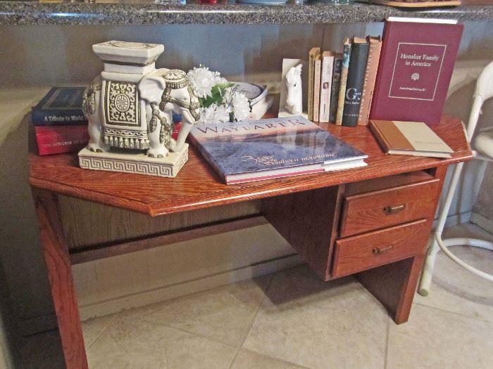 Small oak desk, ceramic Tai elephant, books (some heritage books)