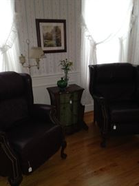 Two more matching recliners; small side table in between