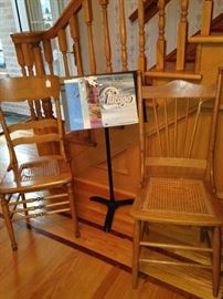 Cane bottom chairs (one - as is); music stand