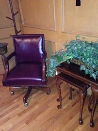 One of several desk chairs; hat rack; stack tables