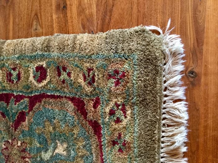 Beautiful detailing on this handmade rug!