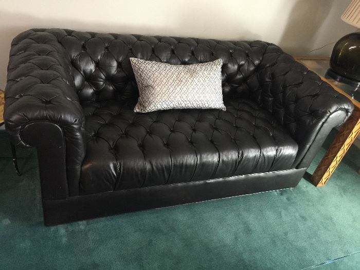 85. Pair of Black Leather Chesterfield Loveseats (71" x 34" x 28")