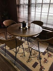 MCM WOODEN SLATS, WICKER AND METAL ROUND TABLE WITH 4 CHAIRS