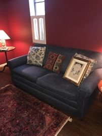GRAY SOFA AND DECORATIVE PILLOWS