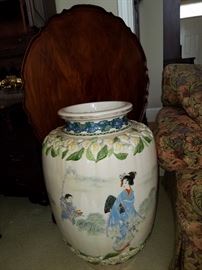 Oriental floor vase with flowers in relief