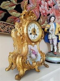 Side view of gilt bronze clock