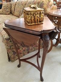 Triple drop leaf stand. Box is molded resin