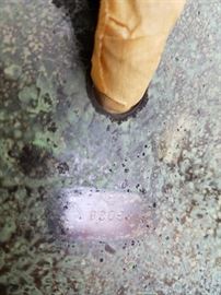 The "P" in a Diamond Pairpoint  lamp is visible above the number in the non-patinated area below where the cord exits the lamp