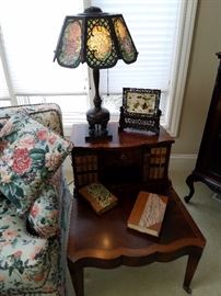 Step table displaying a Pairpoint painted glass panel lamp in a Lilac pattern.  Acorn pulls and sockets appear to be original