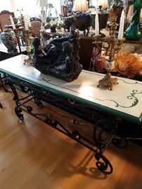 Iron base table with paint decorated top.  Candelabra have painted porcelain knobs.  "Bronzed" group is composition