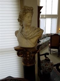 Stone bust (with restoration to base) on a columnar pedestal