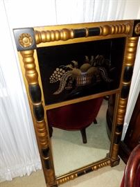 Often referred to as a 'Courting Mirror', this is a Ca. 1960 reproduction of an early 1800's piece. Made by Hitchcock Furniture Co.