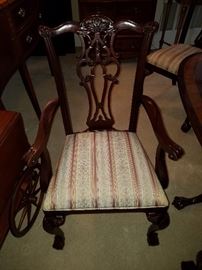 One of the two arm chairs