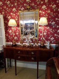 Ethan Allen sideboard/buffet displaying Capo-di-Monte and other porclains