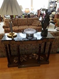 Marble top console or sofa table displaying lamp, Victorian era bride's bowl in "Tree of Life" pattern, and bronzed cast metal figural sculpture