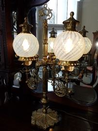 Opalescent swirl shades on the Victorian style lamp