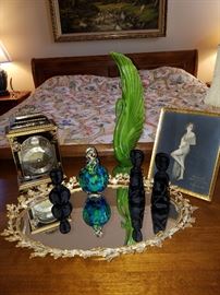 Grouping of perfume bottles and other decorative objects.