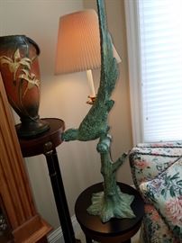 Patinated metal parrot sculpture