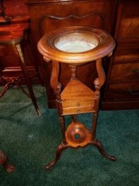 Plant stand style adapted from a shaving stand.  Ca. 1940.