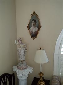 Corner grouping.  Note, damage to the porcelain figure (missing fingers on raised hand), and losses to the oval frame.