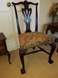 Appears to be a Centennial (Ca. 1890) side chair with ball and claw cabriole legs, carved knees.