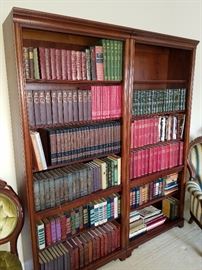 Bookcase and several sets of books (priced by the set)