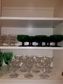 Stemware.  Bottom colorless stems are Baccarat.